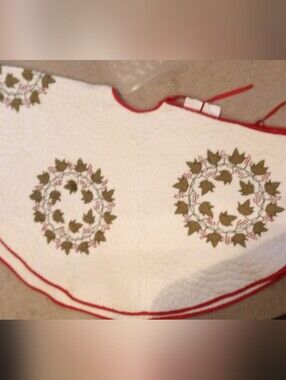White Quilted Tree Skirt with Olive Leaf Wreaths and Red Trim